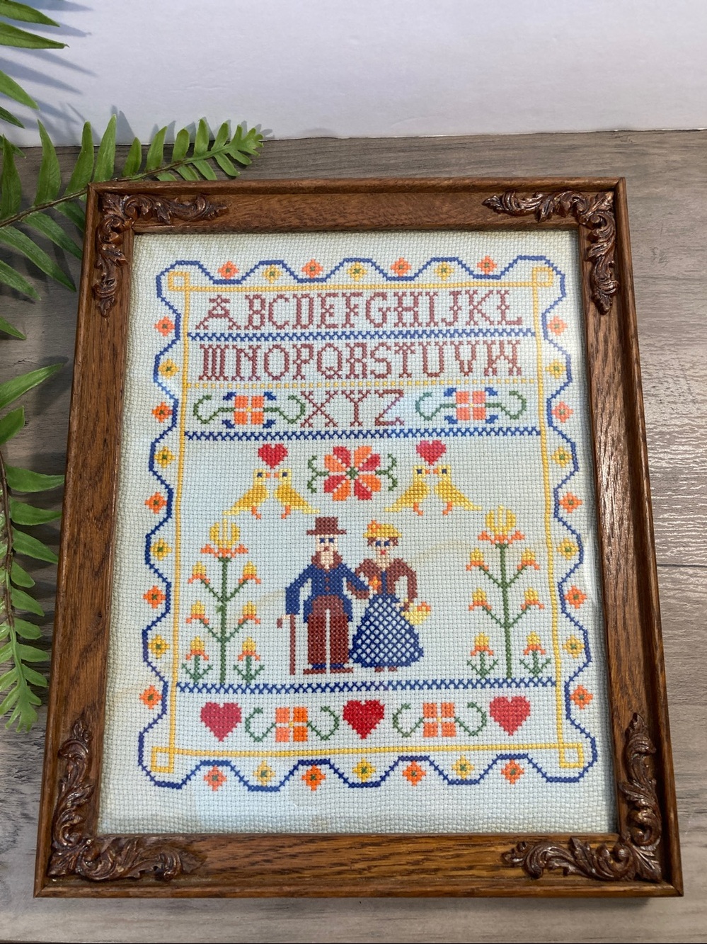 Vintage Framed Cross Stitch Sampler With Alphabet Flowers Birds And Couple